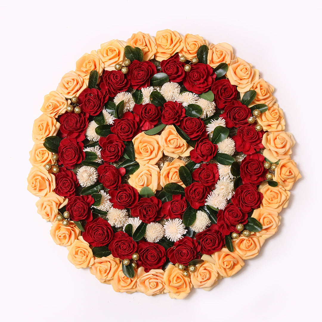 Saanjh Rangoli Mat with red and peach shola roses from The Maeva Store