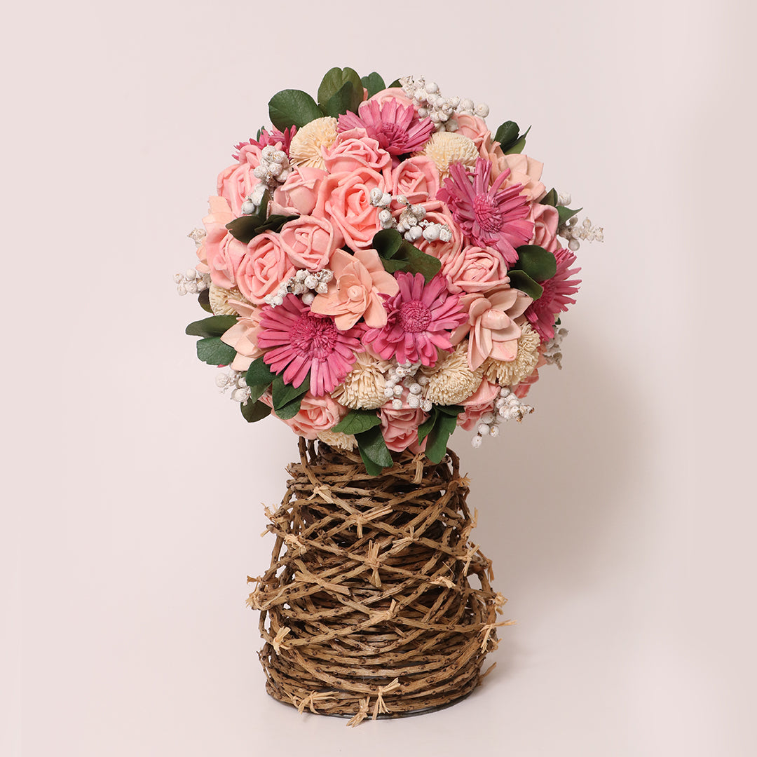 Pretty pink artfully crafted rose flower bouquet